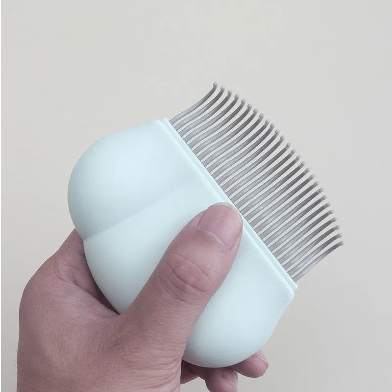 Paw Soft Deshedding Brush grooming tool for cats and dogs in blue, pink, or white on a white background.