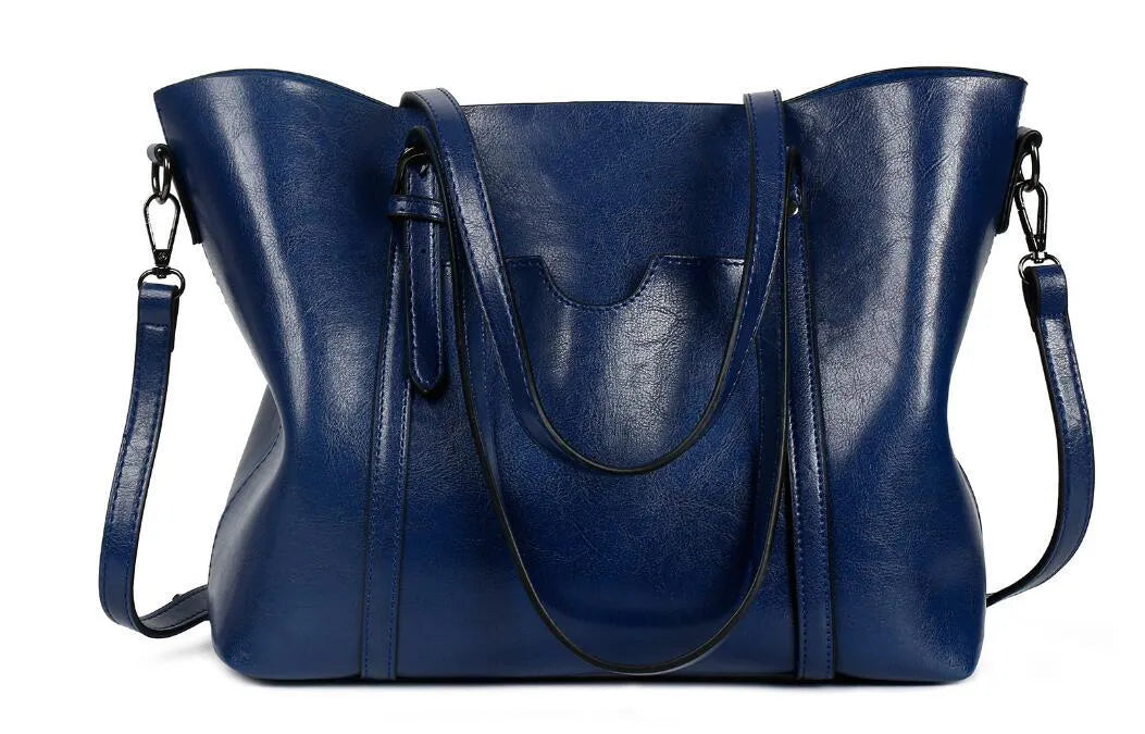 Retro messenger bag for women showing coffee colour option with A4 magazine for scale