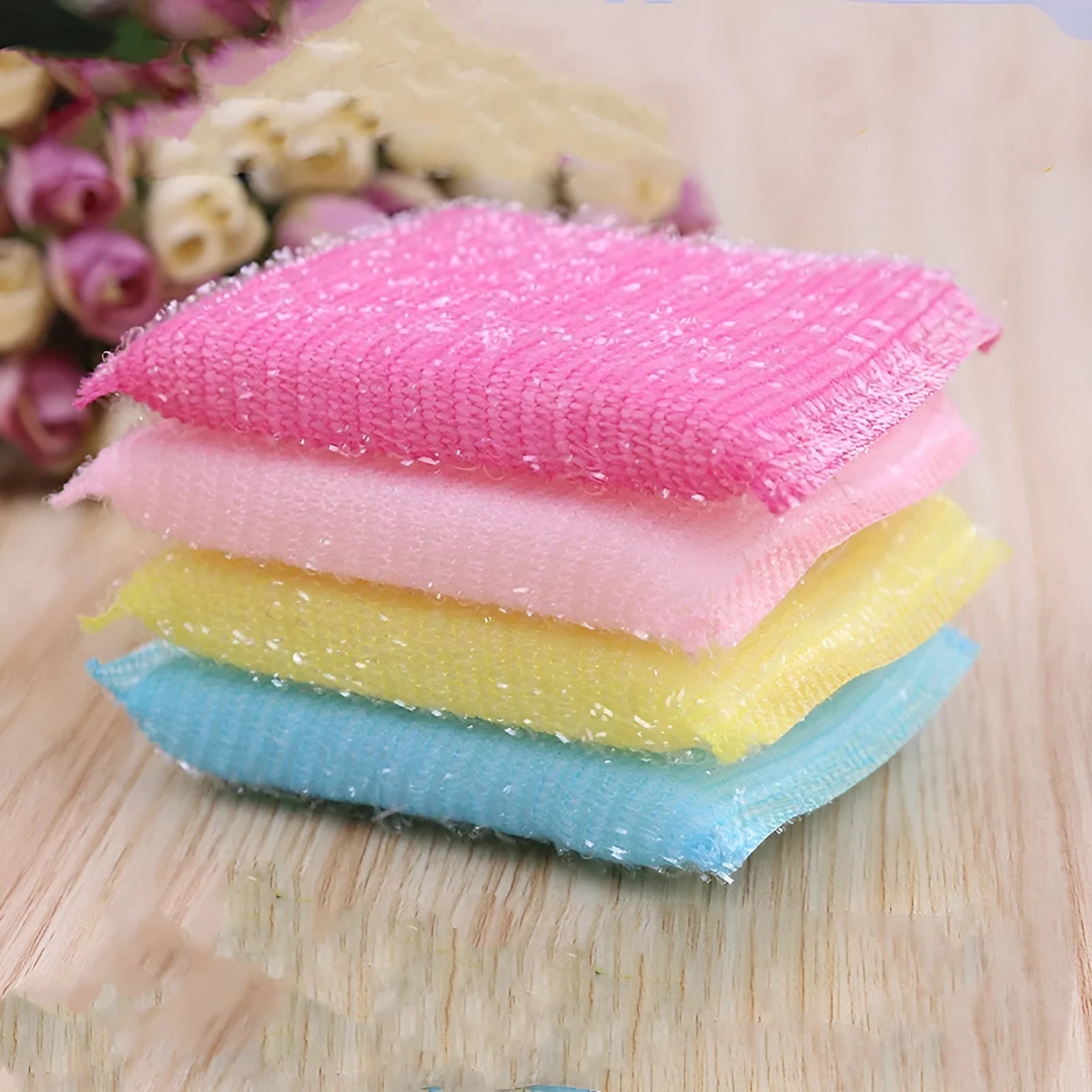 Pinstripe fabric dishwashing spong mop in macaron colours showing sponge, plastic, and silk thread construction.