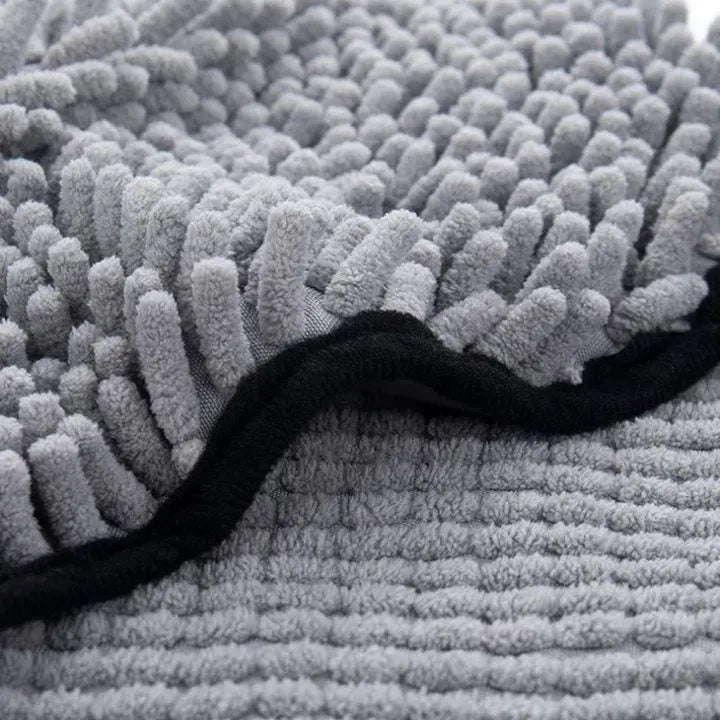 Blue soft fibre pet bath robe towel laid flat, showing its size next to a dog silhouette.
