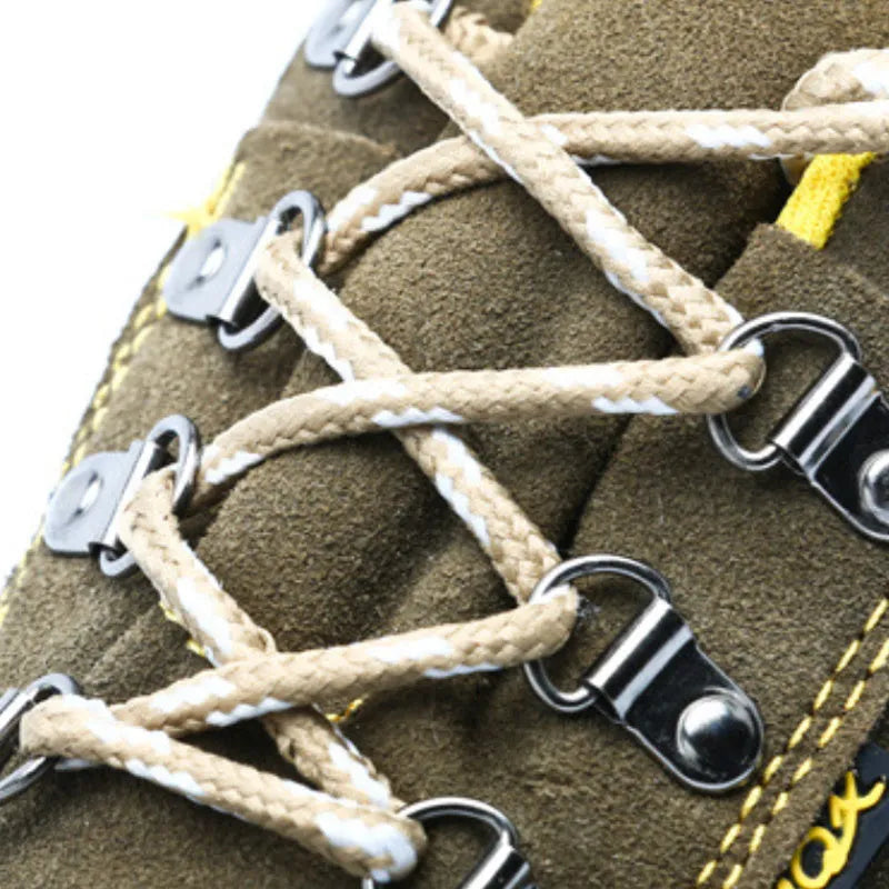 Bronze cowhide leather low-cut safety boots with a steel toe cap and solid rubber tread sole.