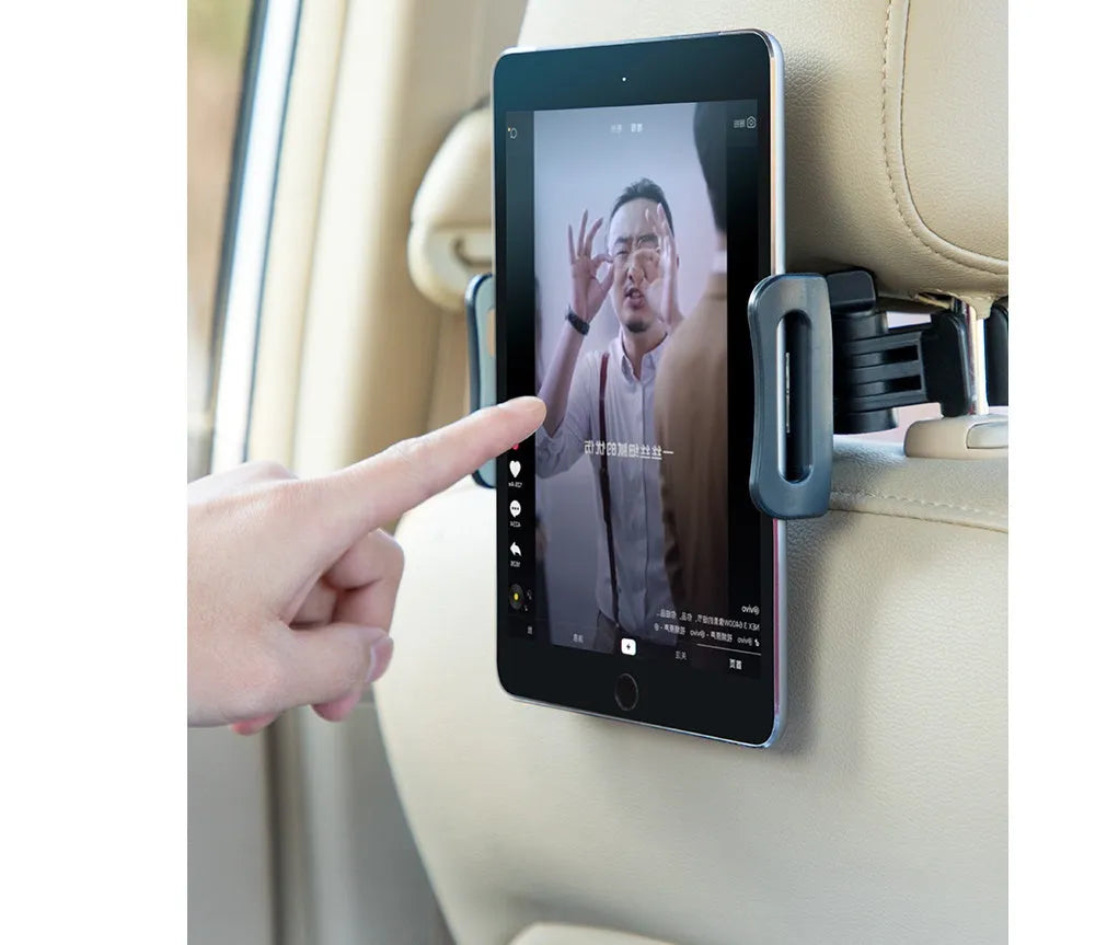 Black universal car phone and tablet holder mounted on a car rear seat base.