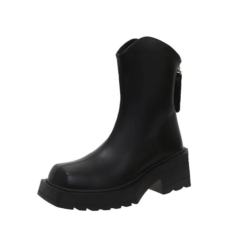 Black and brown platform Martin boots with square toe, high heel, and back zipper closure.