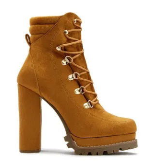 Women's suede ankle boots with thick heels, waterproof platform, and round toe design in multiple colours