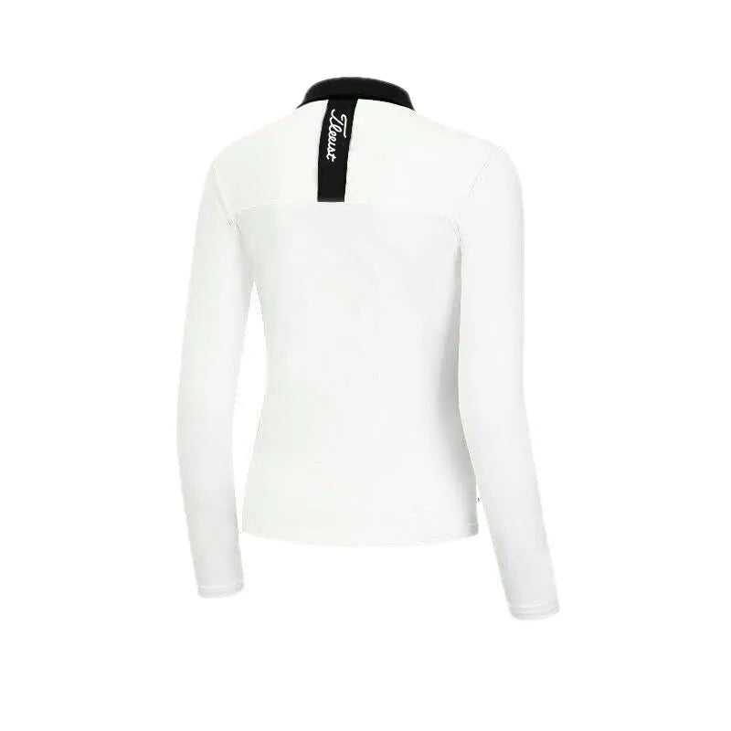 Women's white long sleeve golf top with slim fit made from breathable polyester fabric