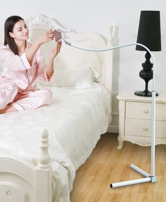 Black and white mobile phone bed bracket for bedside mounting with universal phone holder