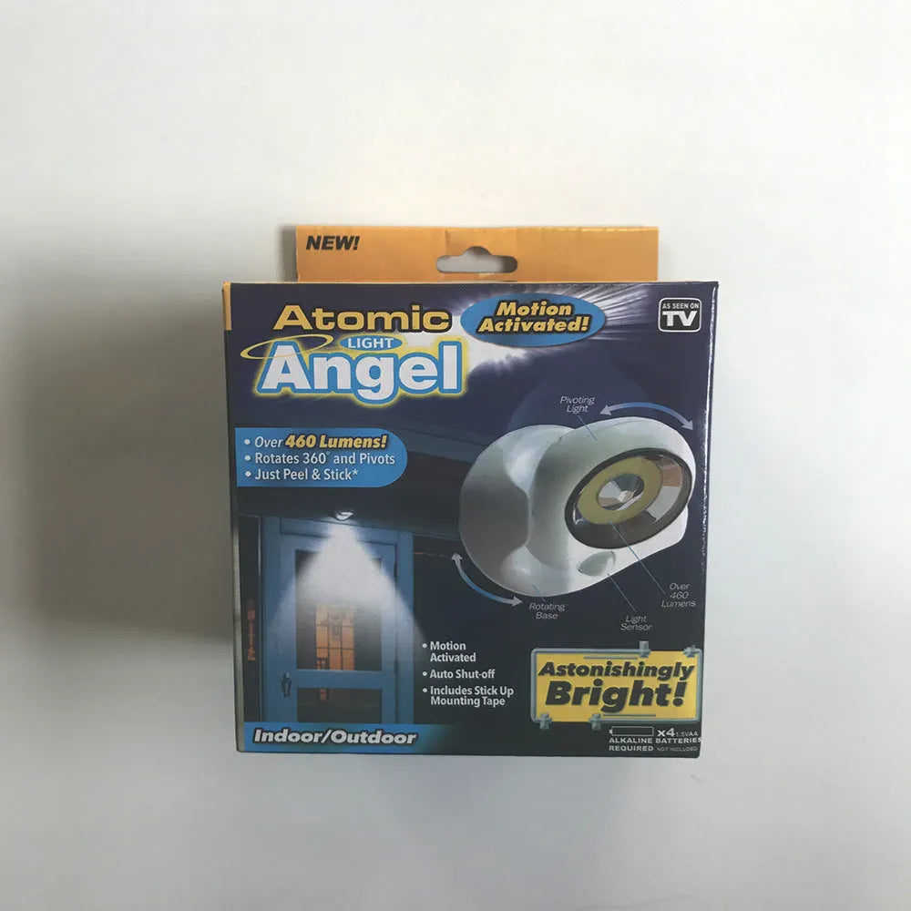 White Atomic Angel induction lamp made of ABS plastic on a plain background