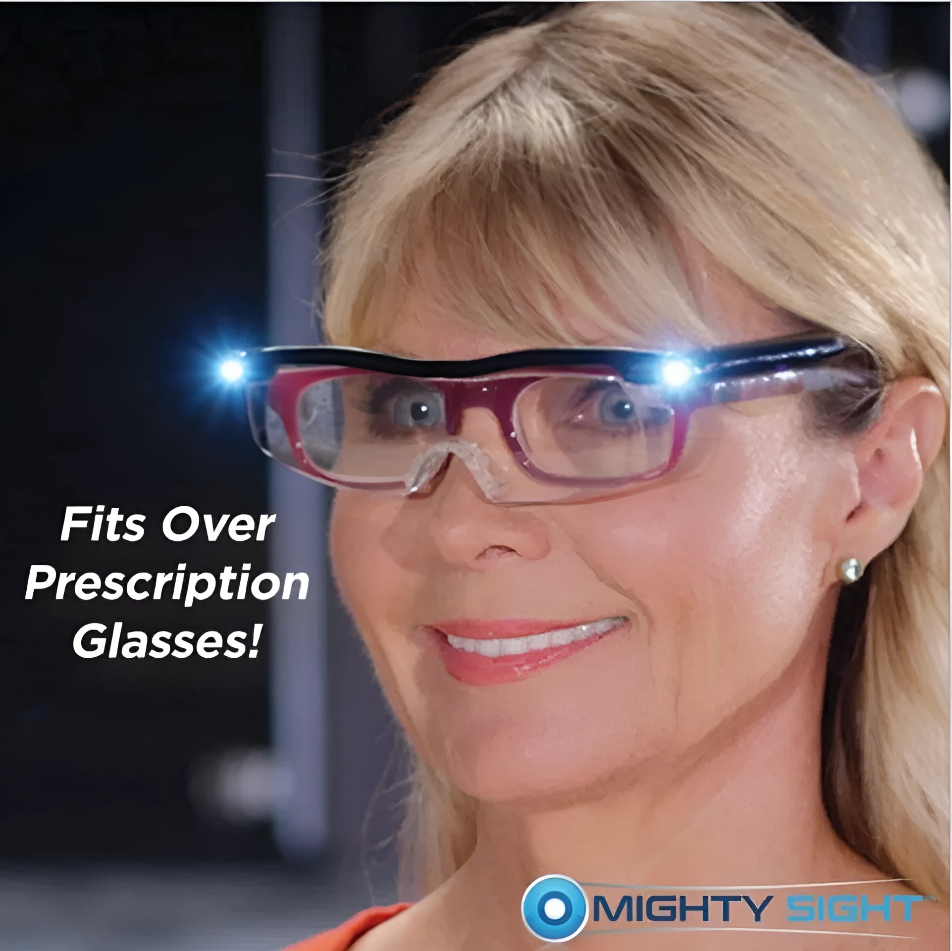 Transparent black USB LED reading light glasses with illuminated frames on a table.