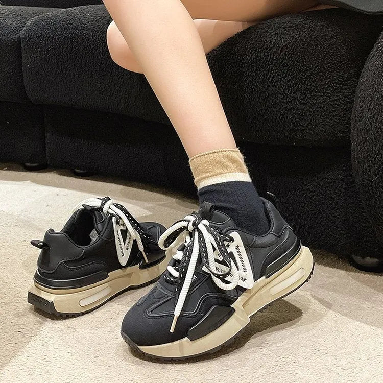 Women's black and khaki red retro platform sports shoes with round toe and lace-up front.