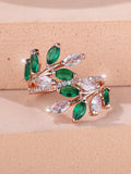 Adjustable horse eye zircon leaf ring in copper on a hand, showing leaf detail and colour options.