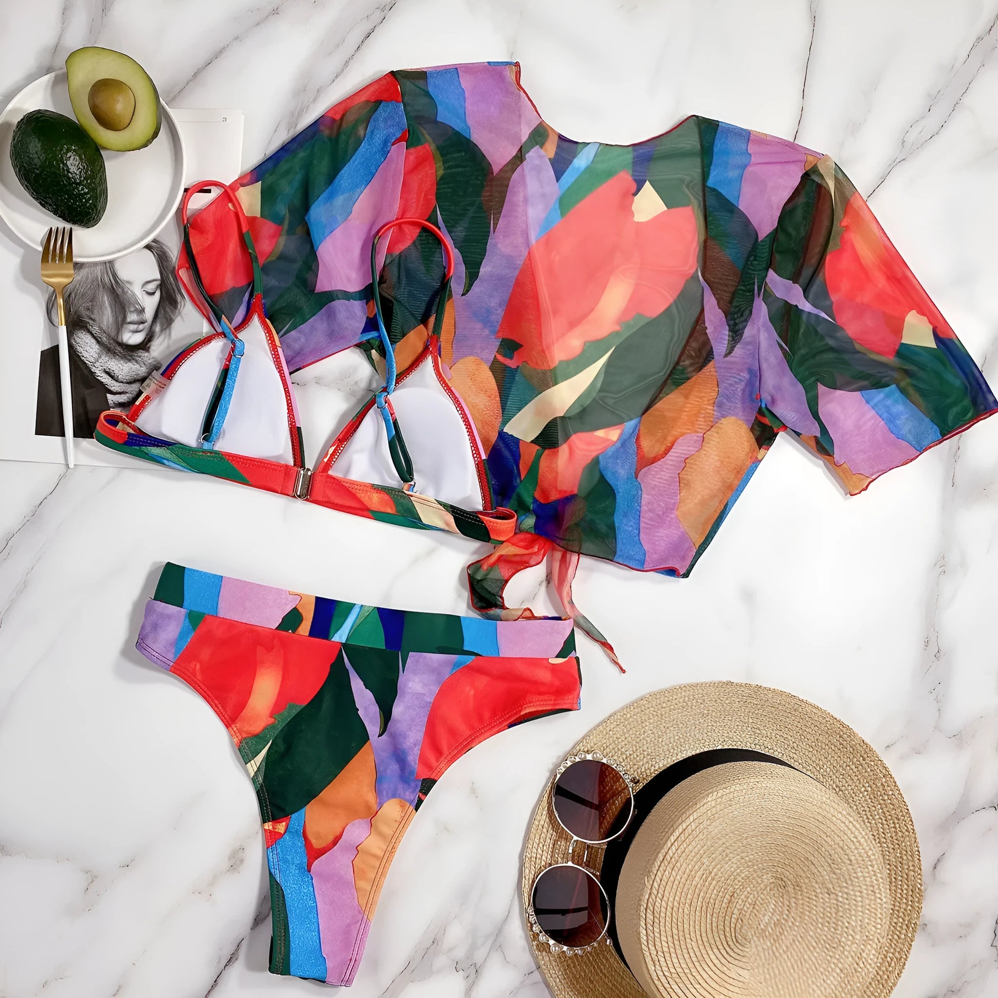 Red printed split swimsuit bikini for women on a mannequin