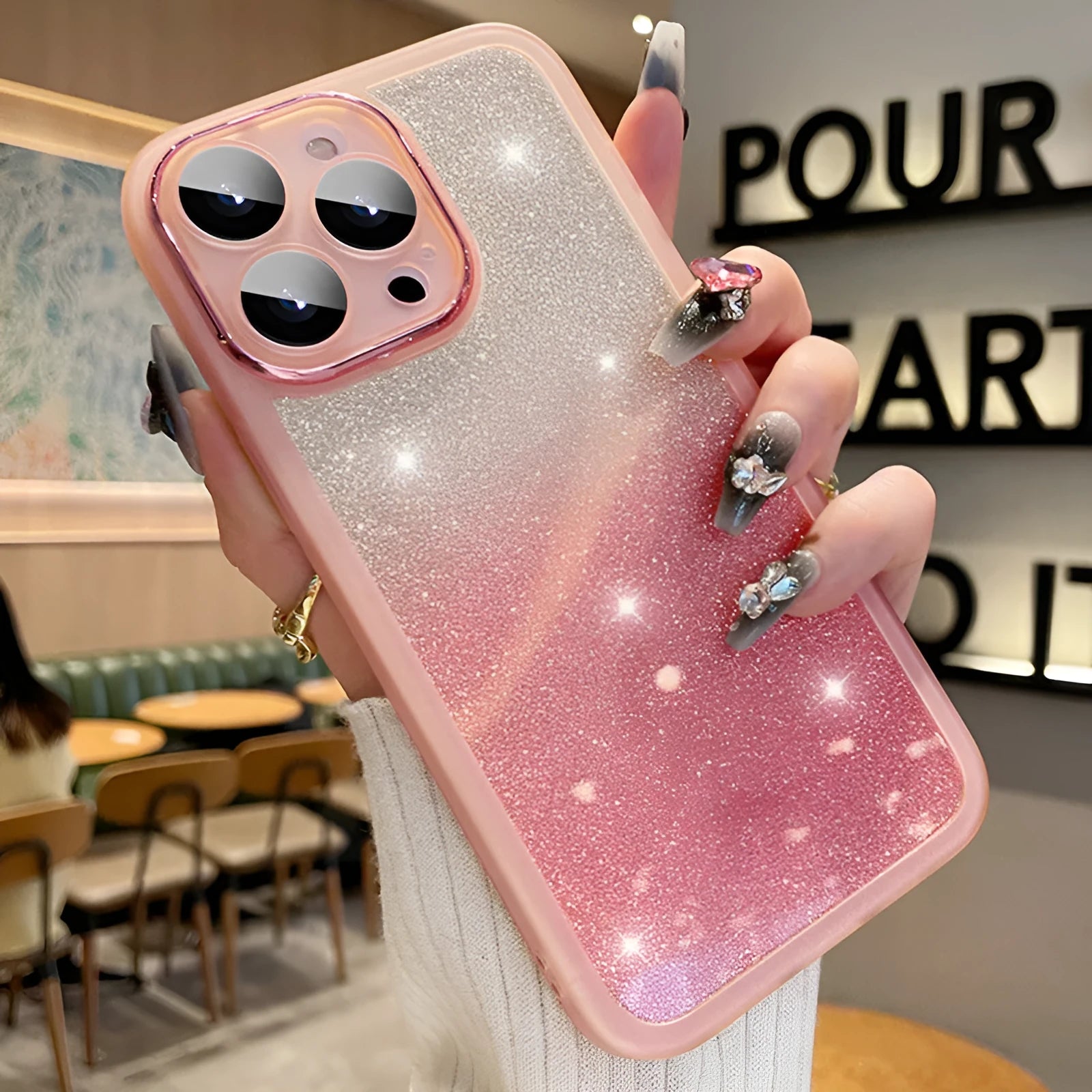 Transparent glitter silver iPhone case with magnetic ring on a smartphone.