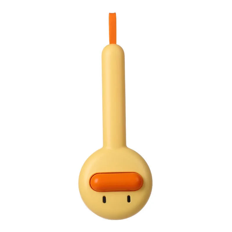 Small yellow duck-shaped pet grooming comb with open section design for cat and dog hair removal