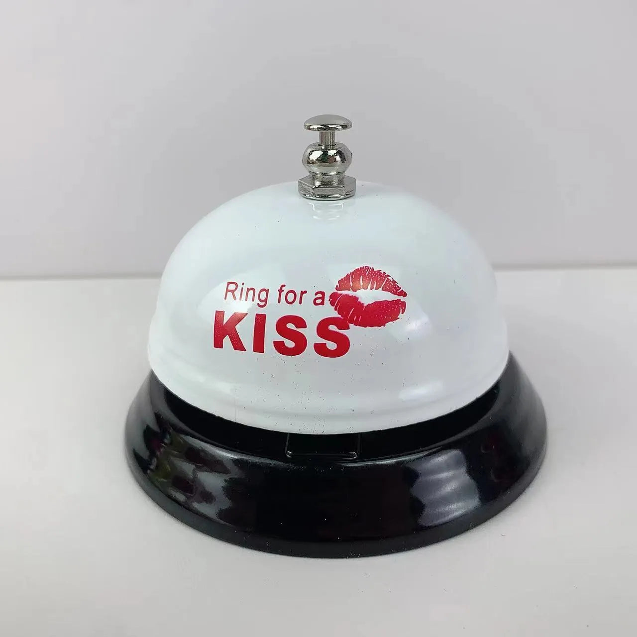 Handheld iron game bell in one of ten colours like red, blue, or green tea, for classroom or restaurant use.