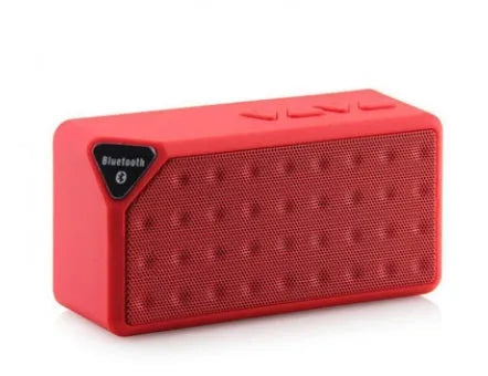 Cannon X3 cube-shaped wireless Bluetooth speaker shown in black, blue, green, red, and yellow colour options.