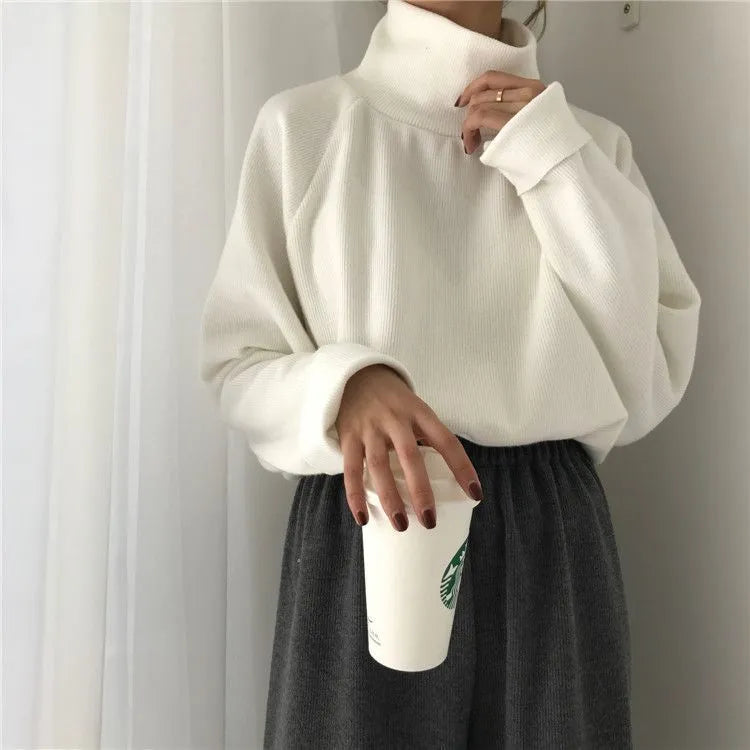 Women's half-high collar long sleeve top in solid colour polyester fabric with loose fit design
