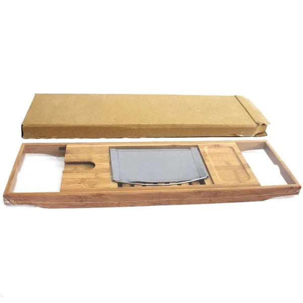 Bamboo bathtub frame storage organiser on bathroom surface holding bathing essentials