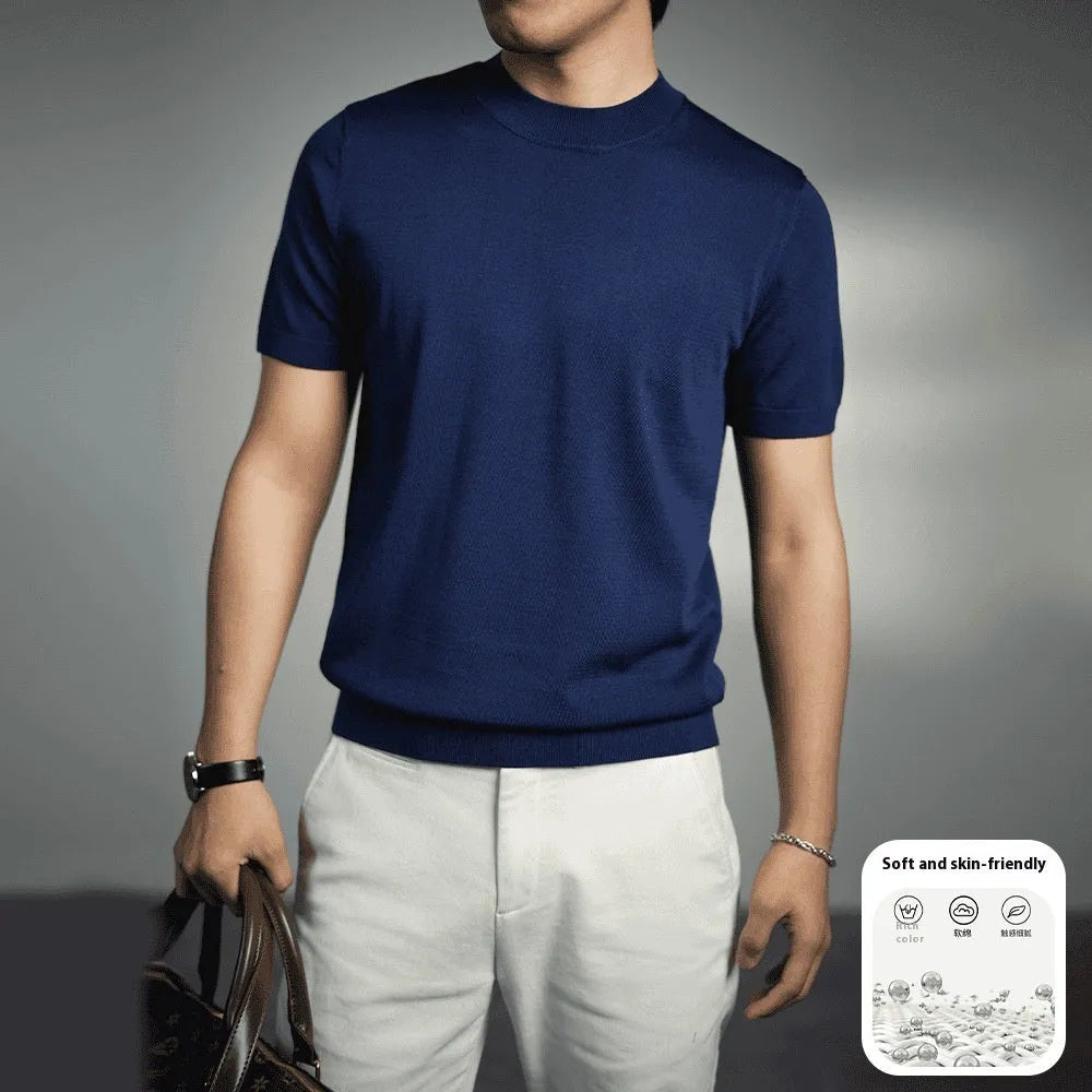 Men's solid colour knitted T-shirt with round neck and short sleeves on a grey background.