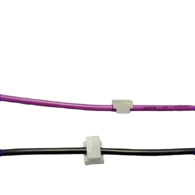 Black PA66 automotive cable management clip with retaining ring for wire organisation