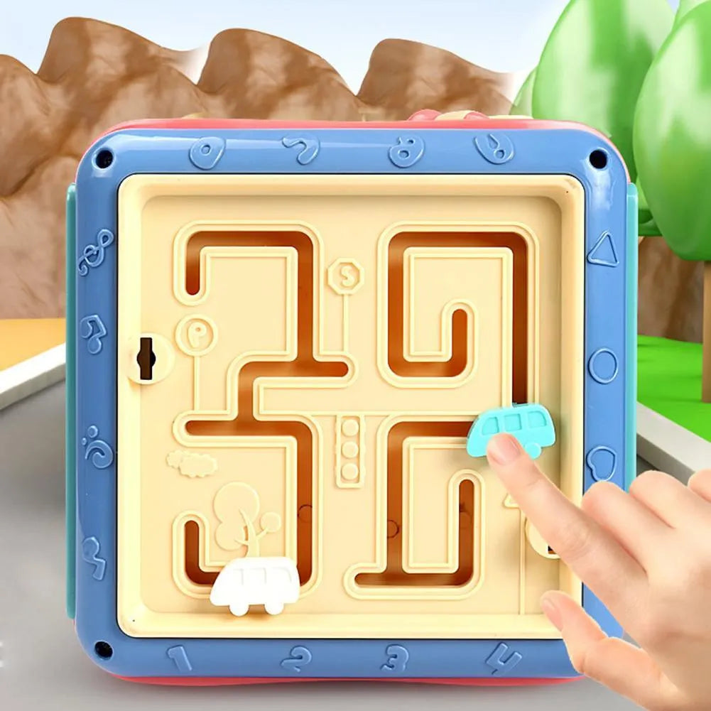 Colourful hexahedron educational cube with bead mazes, gears, numbers, and vehicle graphics