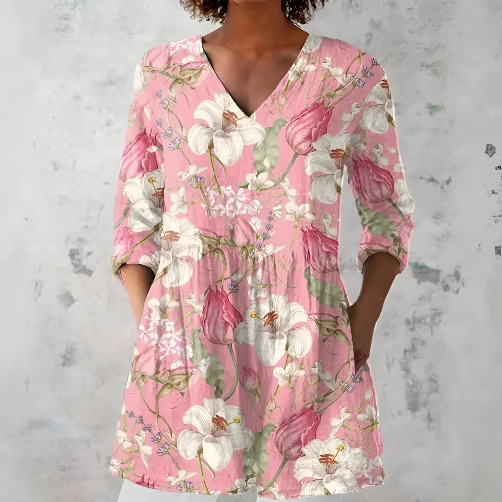 Women's slim-fit retro printed long-sleeved polyester top on a hanger, showing detail of digital print.