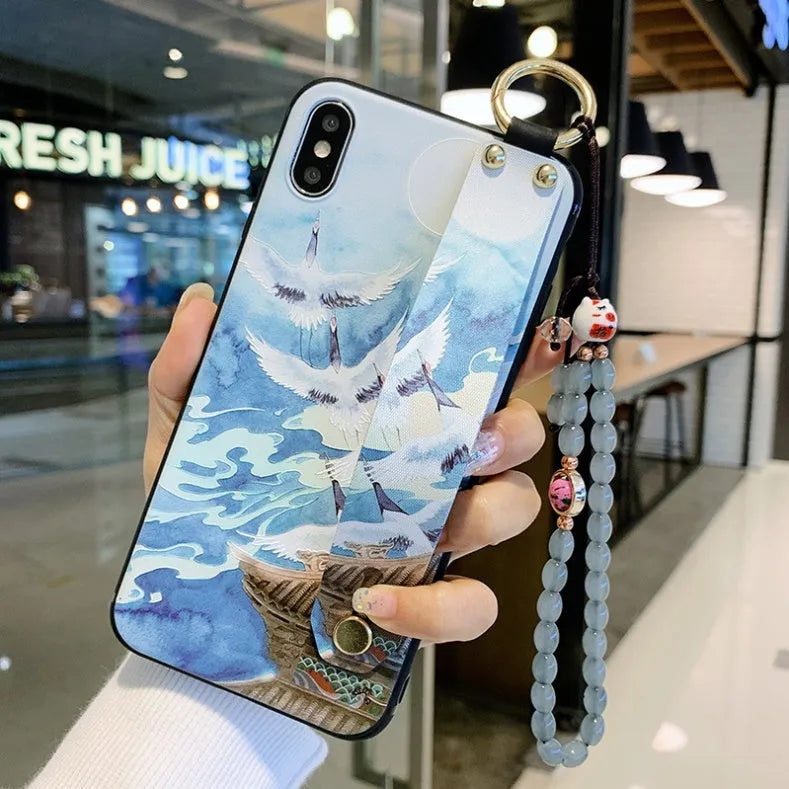 Rose floral patterned phone case with a wrist strap attachment point for iPhone.