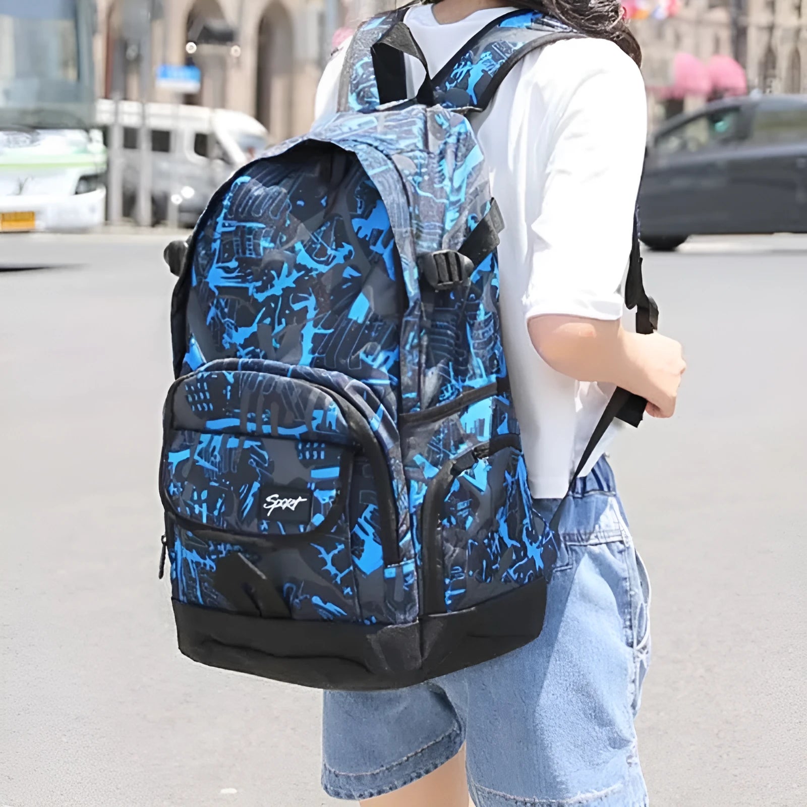 Classic large blue nylon backpack and classic large red nylon backpack side by side.