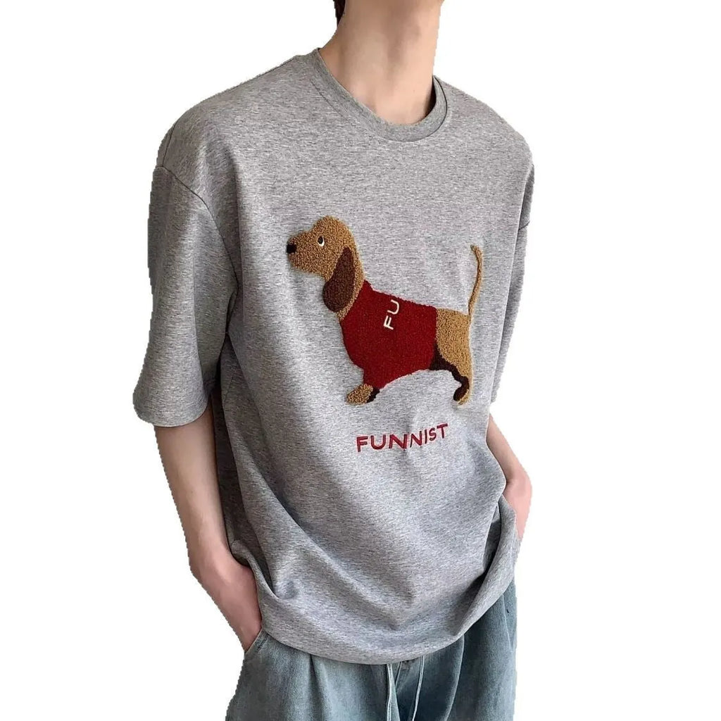 Men's grey cotton t-shirt with an embroidered black and white dachshund dog design on the chest.