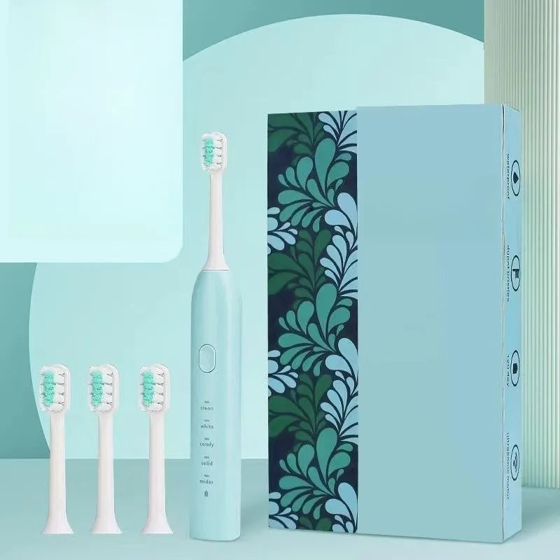 USB rechargeable electric toothbrush in yellow with small duck design and soft bristle head