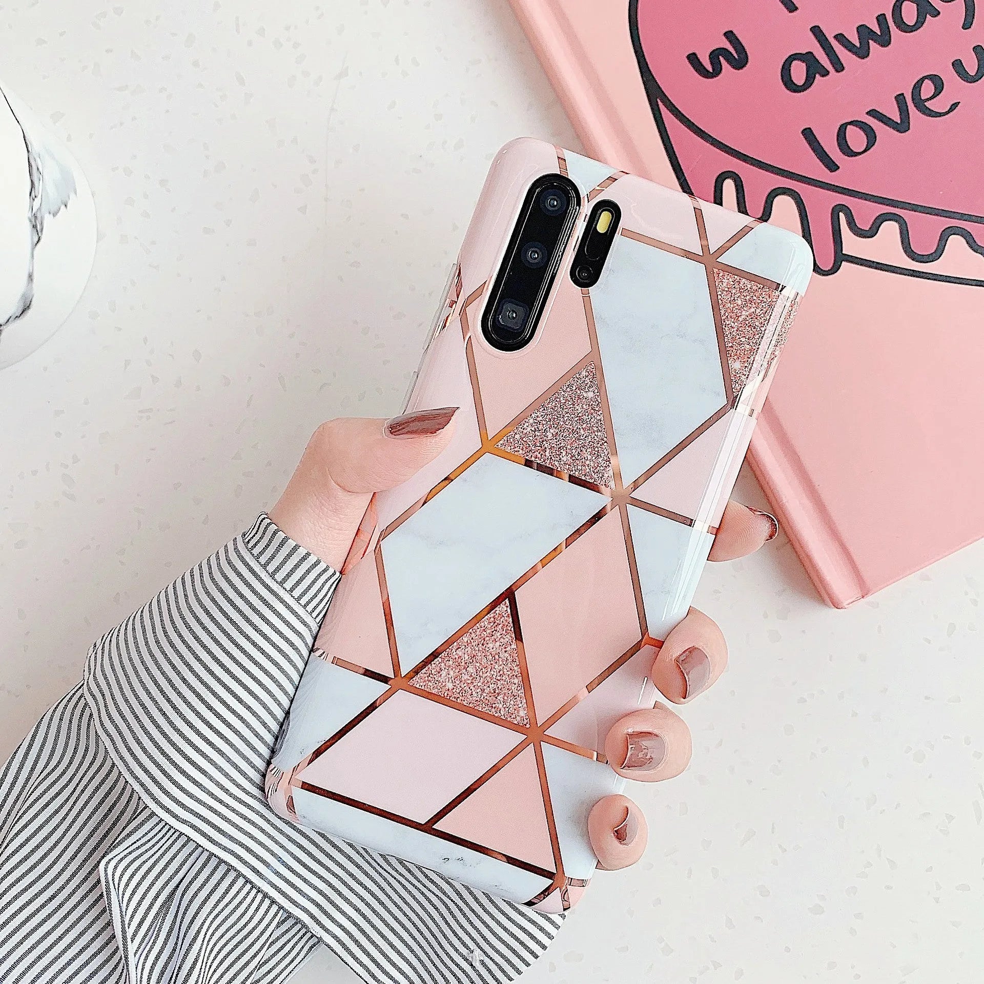 Electroplated marble pattern mobile phone case showing multiple colour options for Huawei and Samsung smartphones