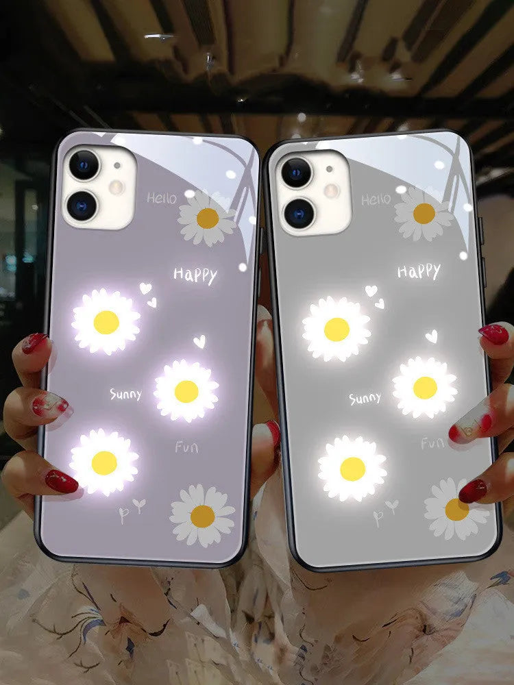 Luminous iPhone case with voice-activated colour light showing painted daisy and broken flower design on TPU protective shell