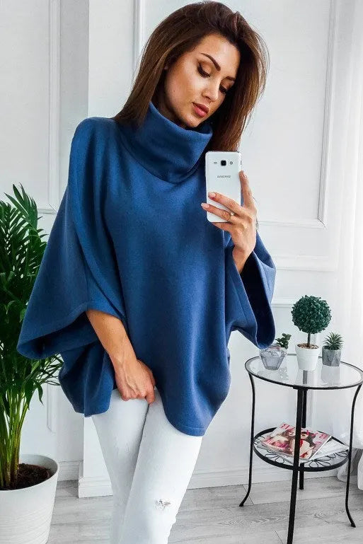 Women's longline batwing sleeve cardigan in a fleece-lined cotton blend, shown with three-button front and contrast stitching.