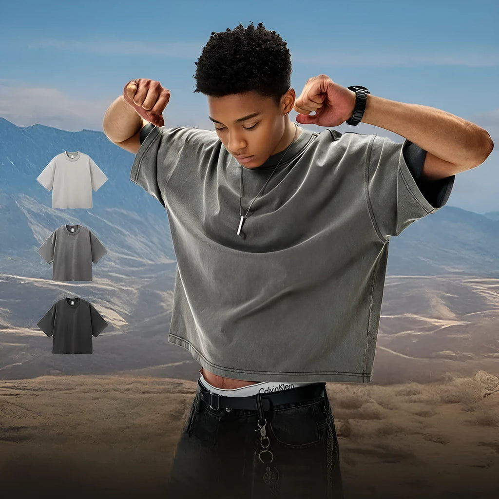 Men's cotton washed-out vintage t-shirt in khaki light showing drop-shoulder sleeve and loose fit