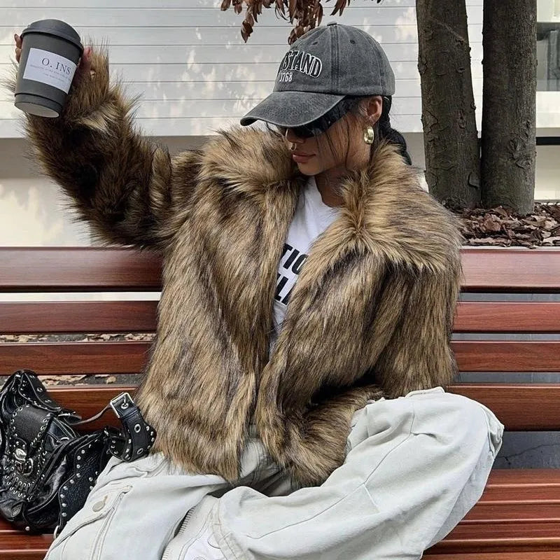 Short-length artificial fur coat with a thick fur collar, shown in one of six available colour options.