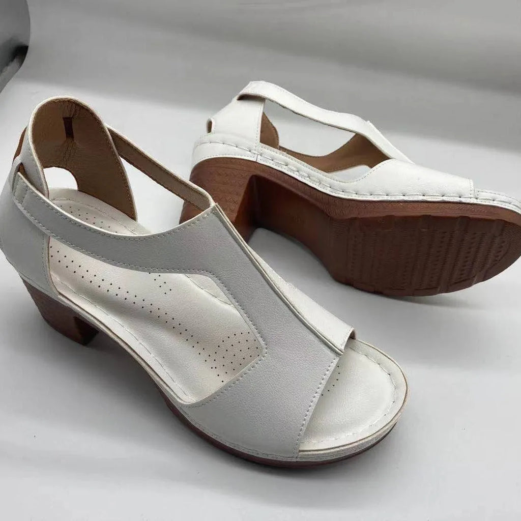 Women's white peep toe wedge sandals with Roman style buckle and low heel