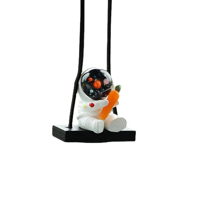 Resin car pendant with cartoon astronaut designs for vehicle interior decoration