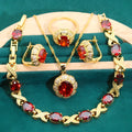 Gold plated cubic zirconia jewellery set showing necklace, earrings, ring, and bracelet with multi-colour stones
