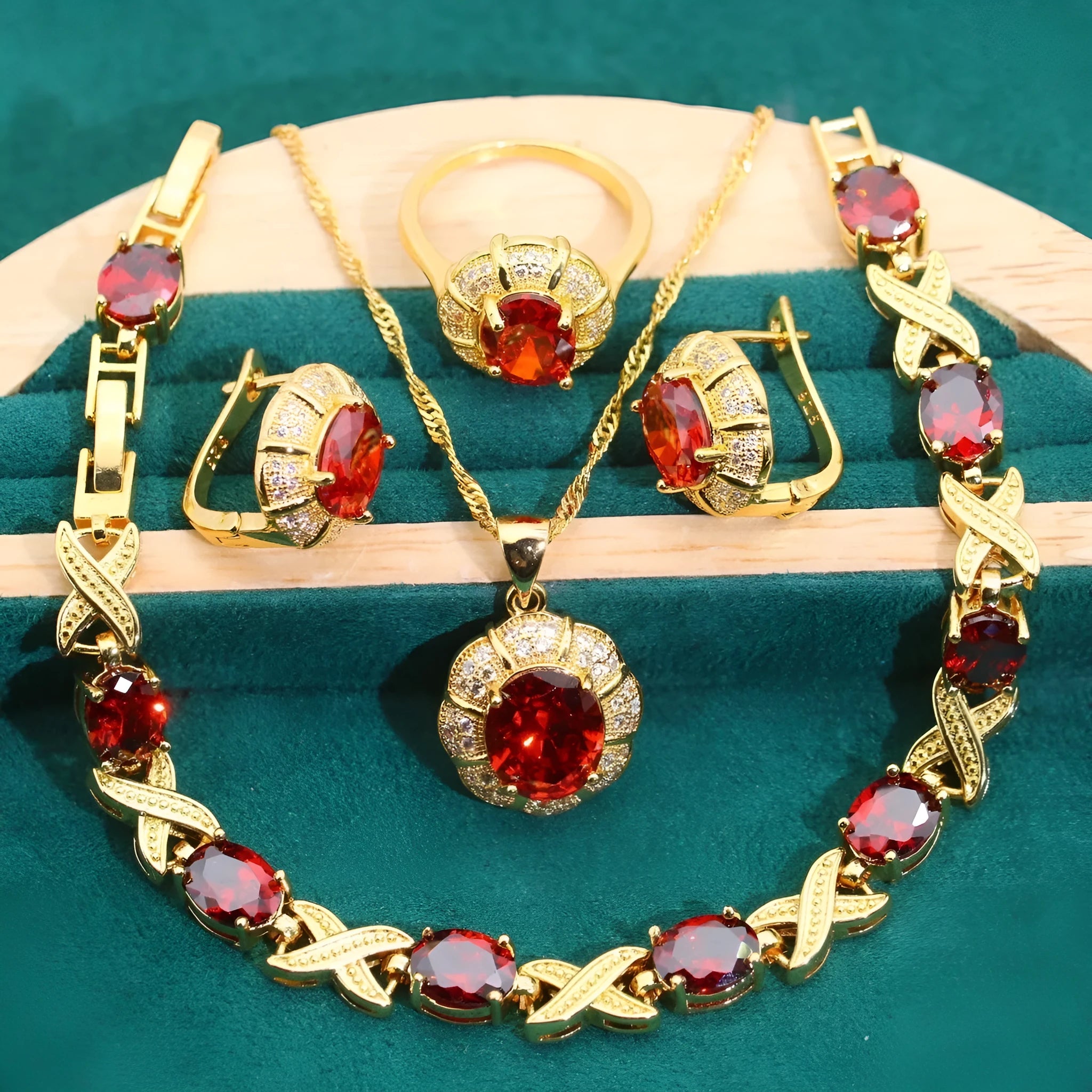 Gold plated cubic zirconia jewellery set showing necklace, earrings, ring, and bracelet with multi-colour stones