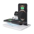 Wireless charging station for phone, watch and headphones on desktop in black finish