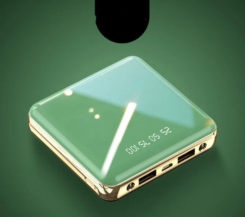 Compact cylindrical 20000mAh mini power bank in blue, green, grey, or red with multi USB ports