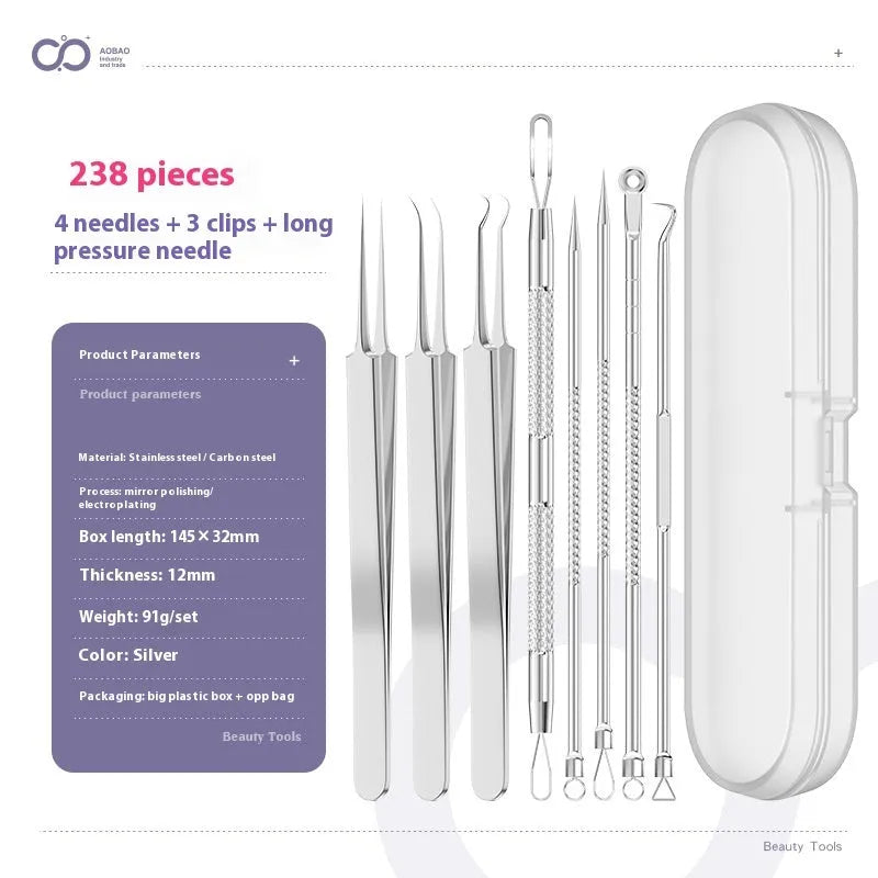 Four metal acne needles with pointed tips arranged on a clean surface.