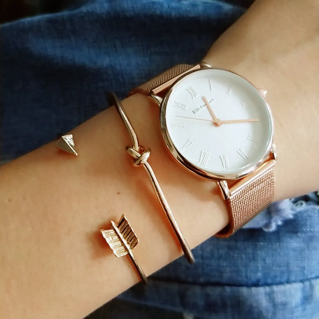 Women's vintage cuff bracelet with arrow knot design in gold electroplated alloy