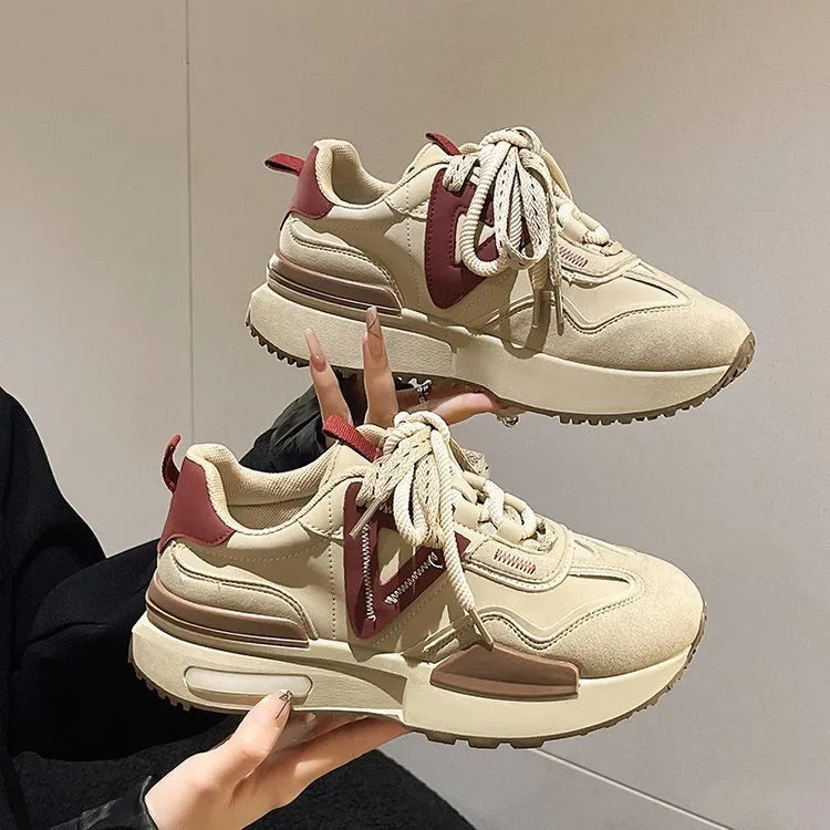 Women's black and khaki red retro platform sports shoes with round toe and lace-up front.
