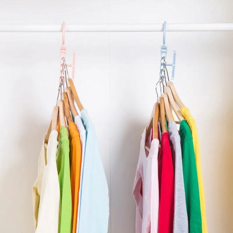 Blue revolving wardrobe hanger with five branches and handle for clothes organisation