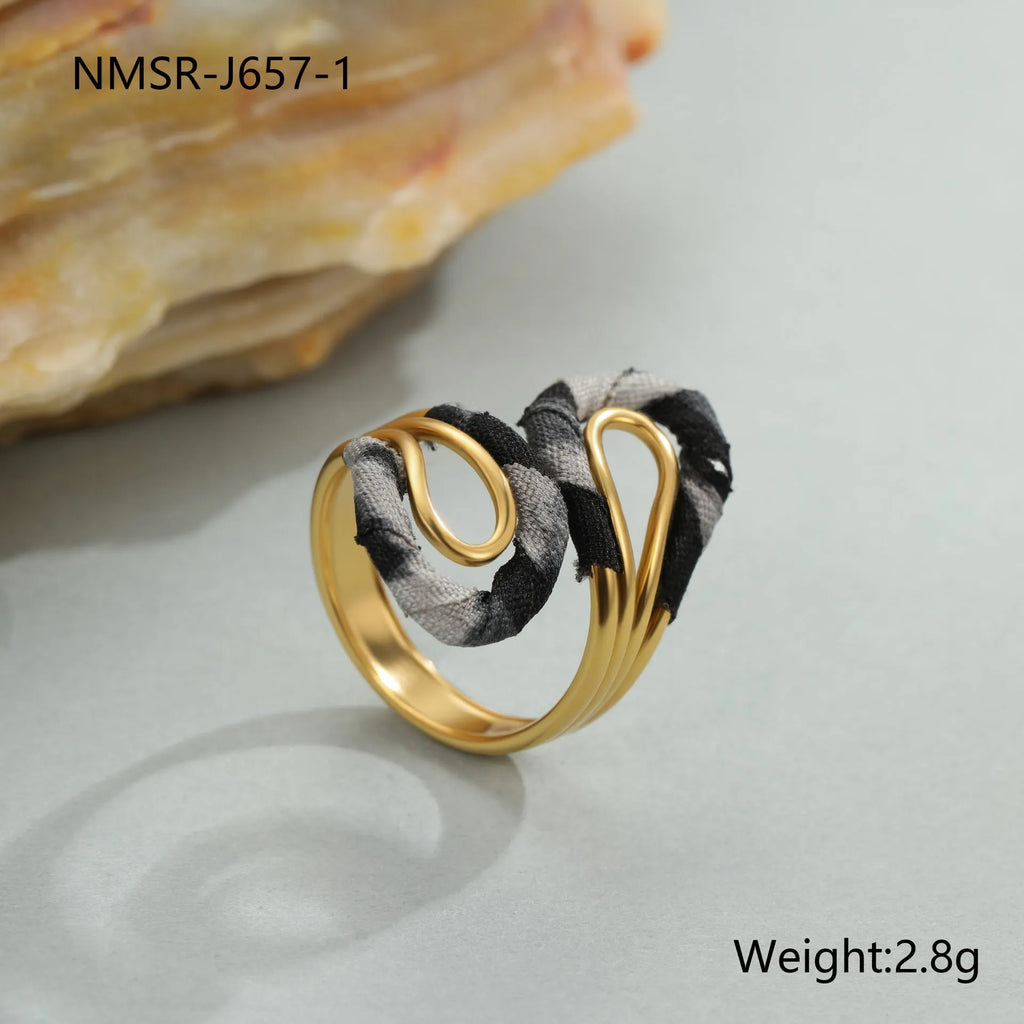 Leopard print geometric open mouth adjustable ring in stainless steel, showing heart shape on finger.