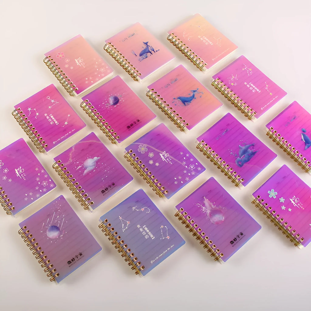 Pack of four rollover coil A7 pocket notebooks showing constellation, sakura, ocean, and universe cover designs