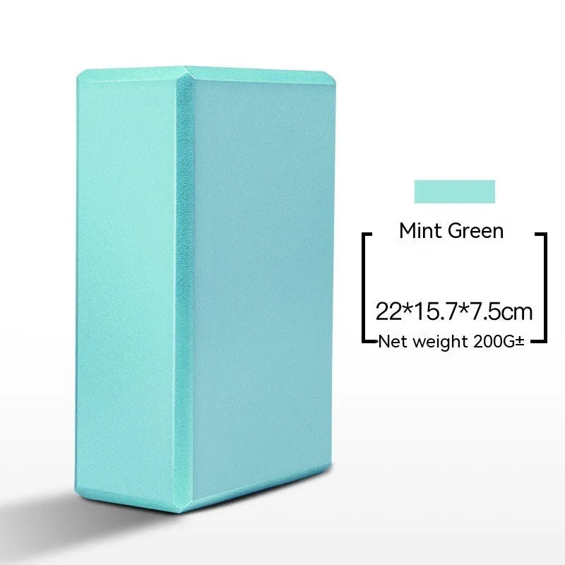 High-density EVA yoga block in pink next to a dark blue block, showing 7.5cm height and printed cartoon design options.