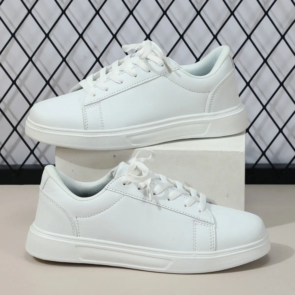 Platform skateboard sneakers in beige brown with cross strap and rubber sole