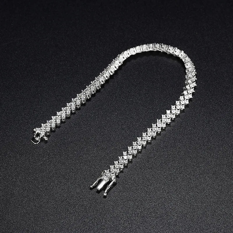 Silver plaid bracelet for women with moissanite stone on neutral background showing woven pattern and clasp