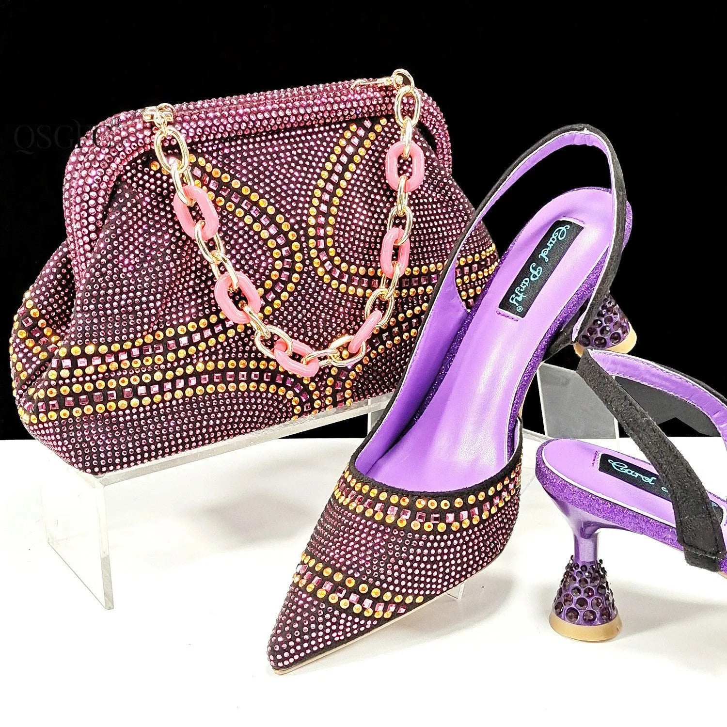Women's pointed toe high heels with matching small bag, shown in a selected colour with a wine glass heel and rhinestone detail.
